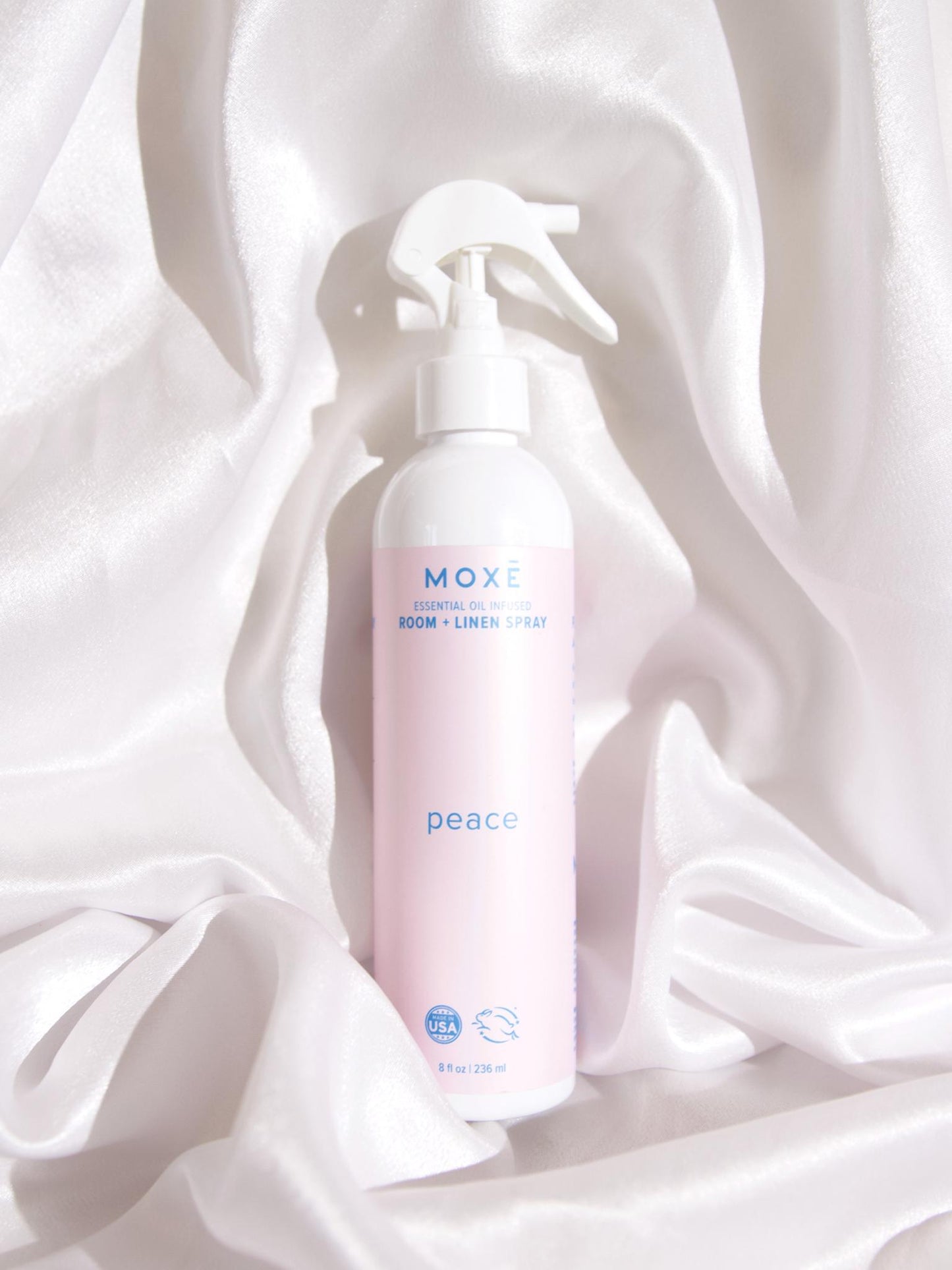 MOXĒ Peace Room + Linen Spray Lying in White Linen