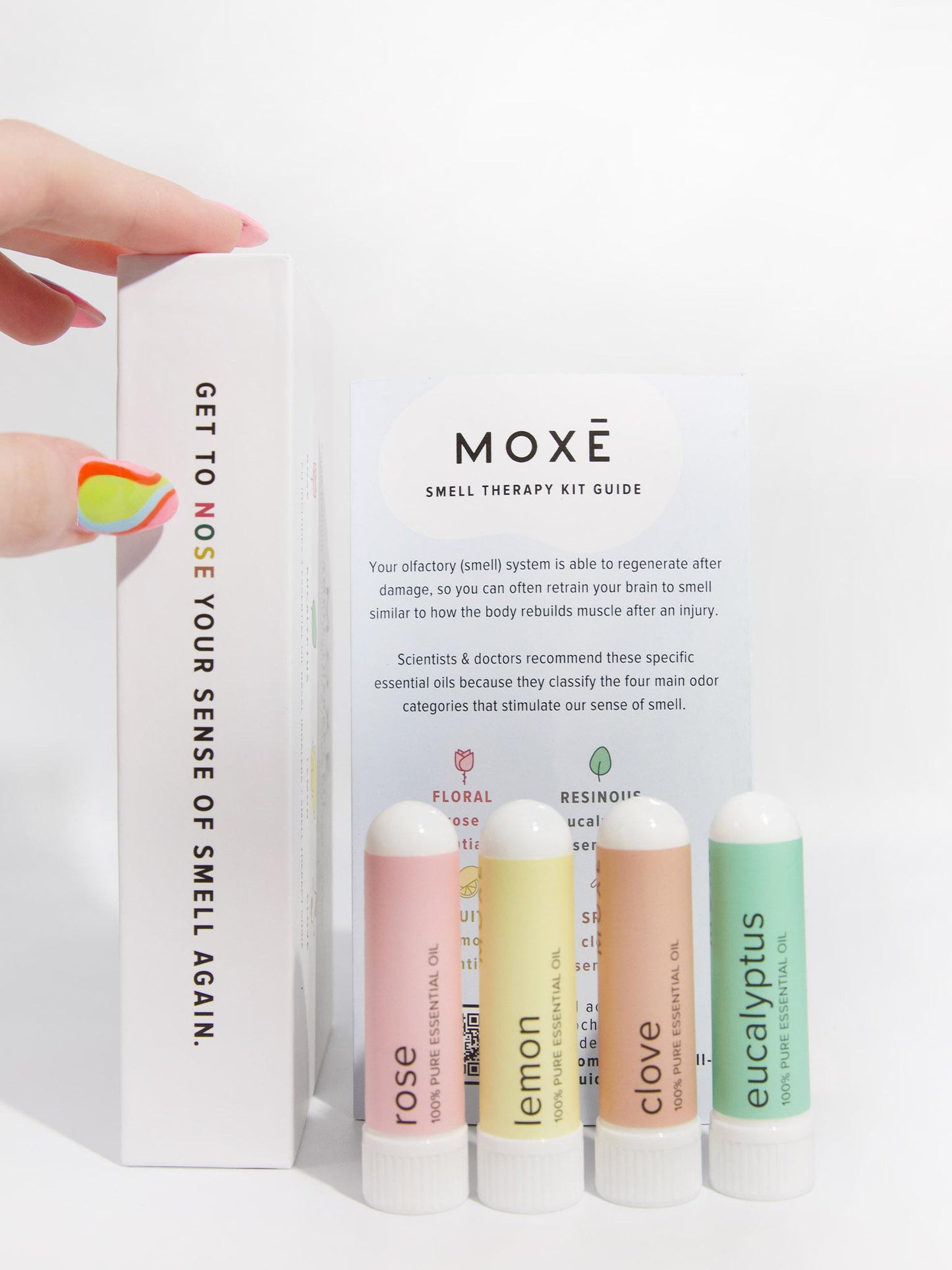 Man Reading Smell Therapy Guide from MOXĒ Smell Therapy Kit