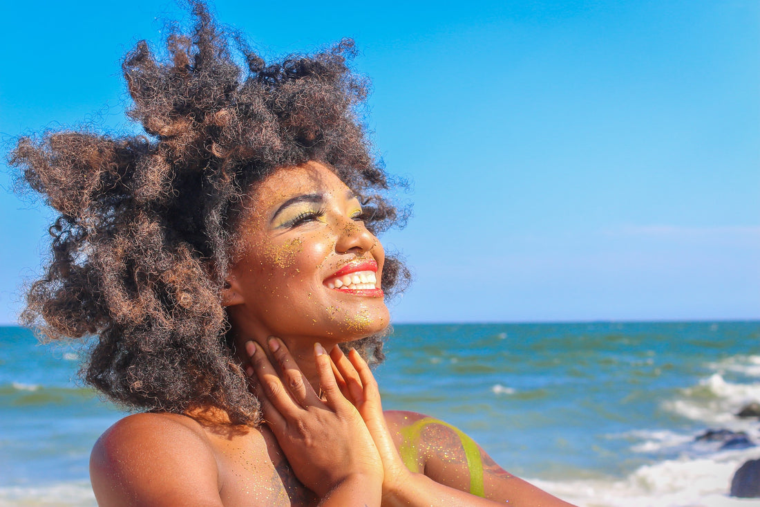 woman smiling with bright white teeth after using essential oils for toothaches