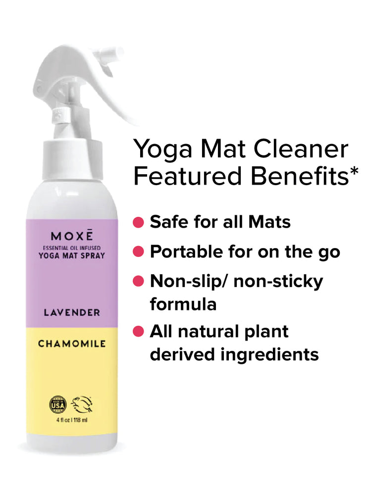 MOXĒ Lavender Chamomile Yoga Mat Spray sitting below rolled yoga mat