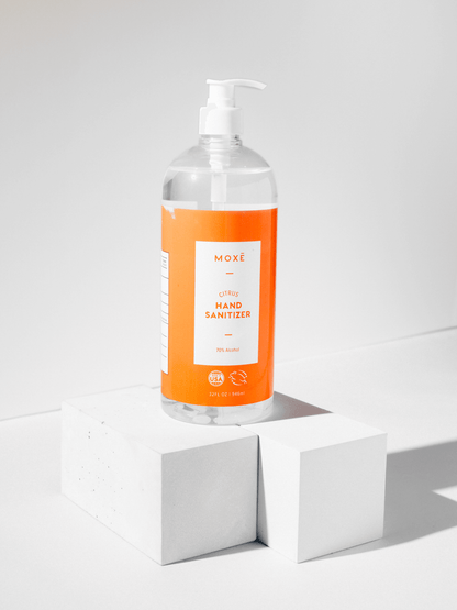 MOXĒ Citrus Hand Sanitizer on blocks for everyday use